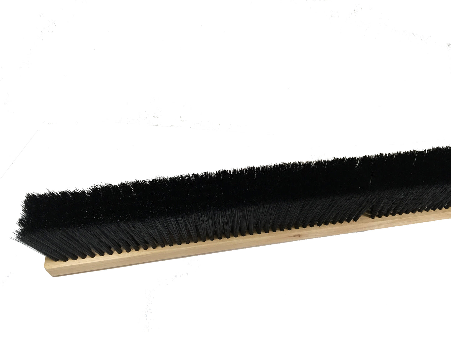 Carolina Mop Push Boom Head Black Polypropylene offers efficient medium sweeping. The wood block is 2-7/8 inches wide and 7/8 inches thick, with a 3-inch trim